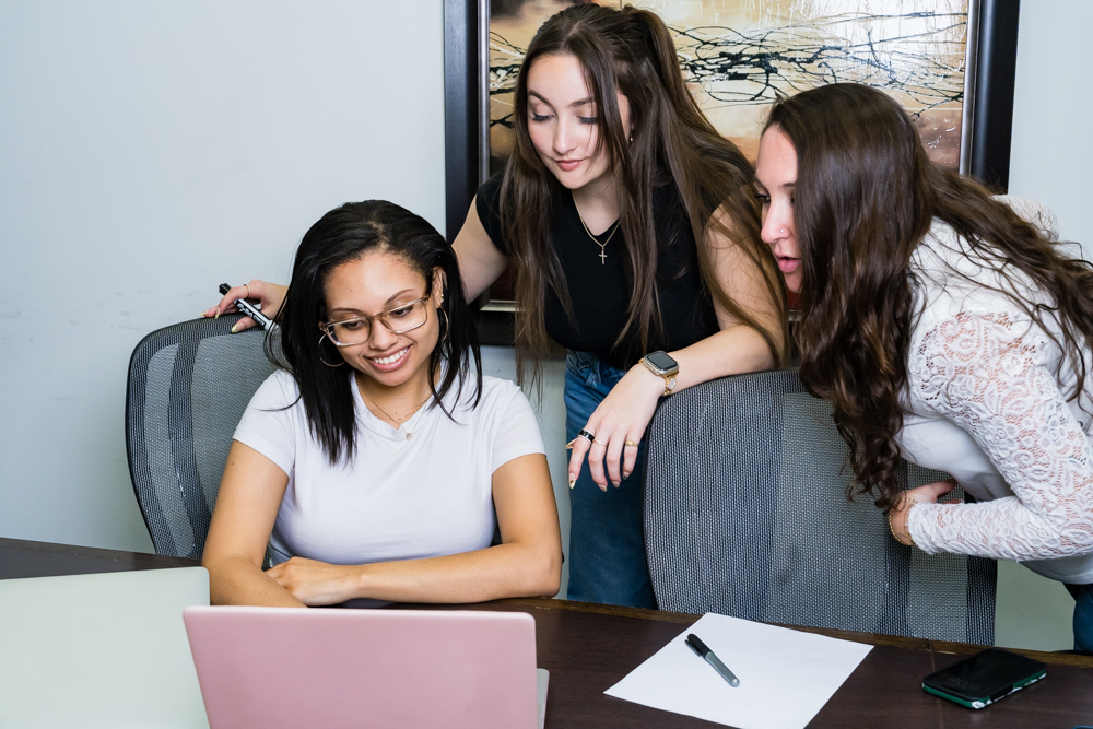 Three Women Looking at the Computer review work