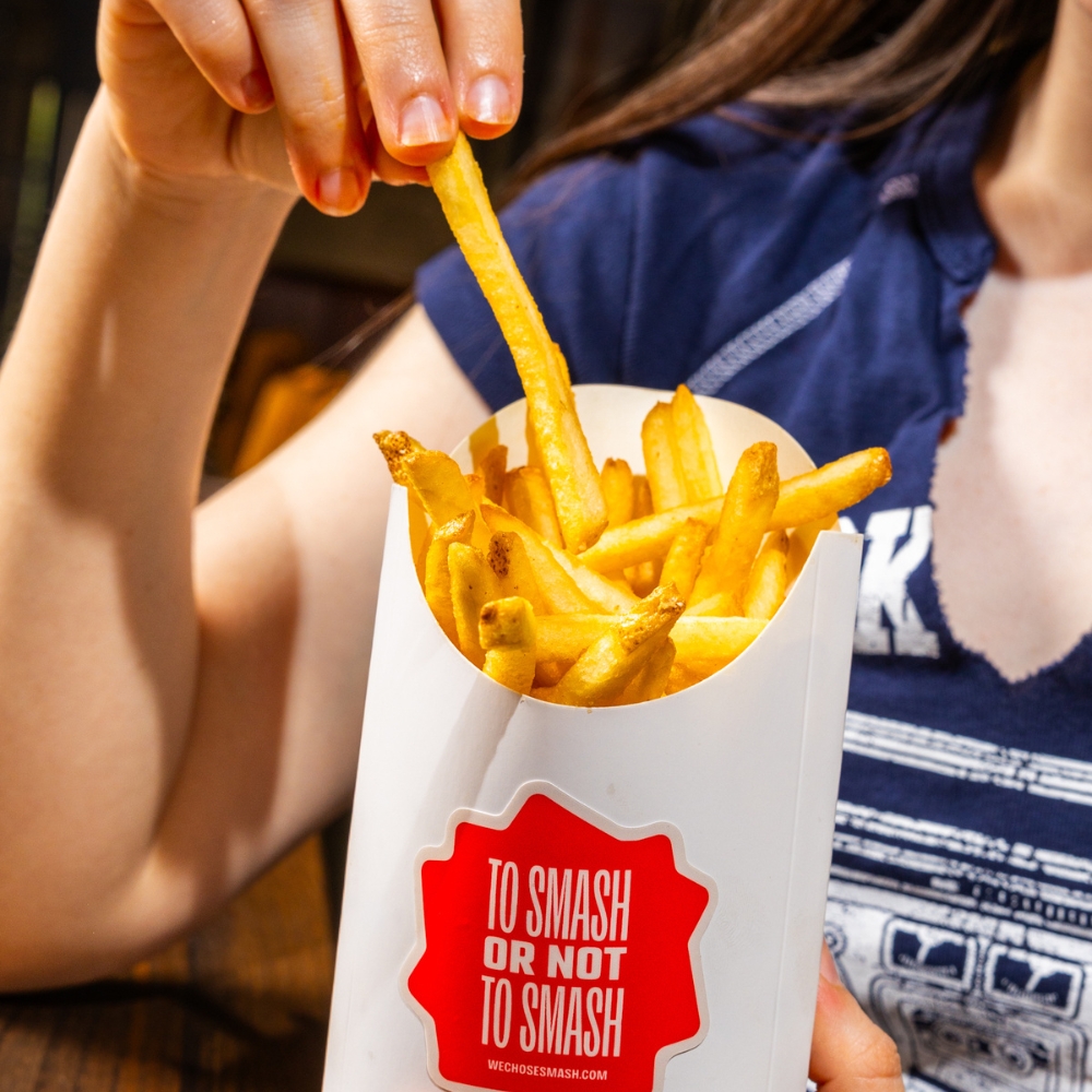 Hand Pulling French Fries