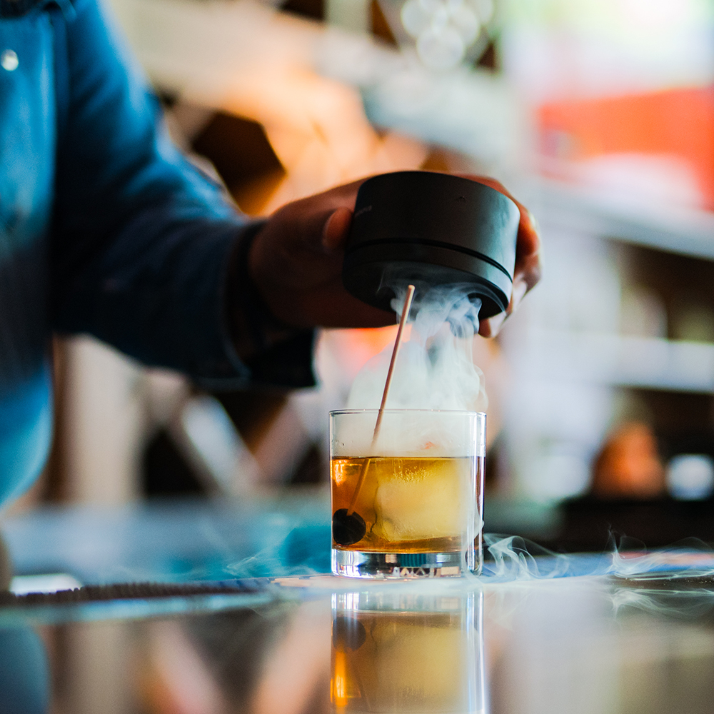 Bartender Smoking a Old Fashion